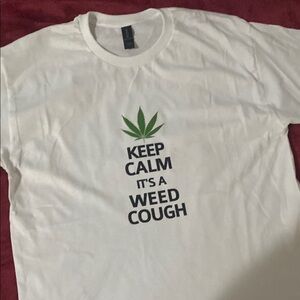 White Graphic Tee with Green Leaf Design